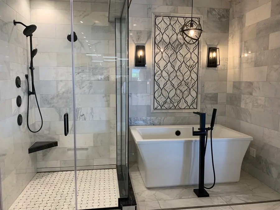 Bathroom with full-height marble tile, frameless glass shower, and freestanding soaking tub, Naperville IL
