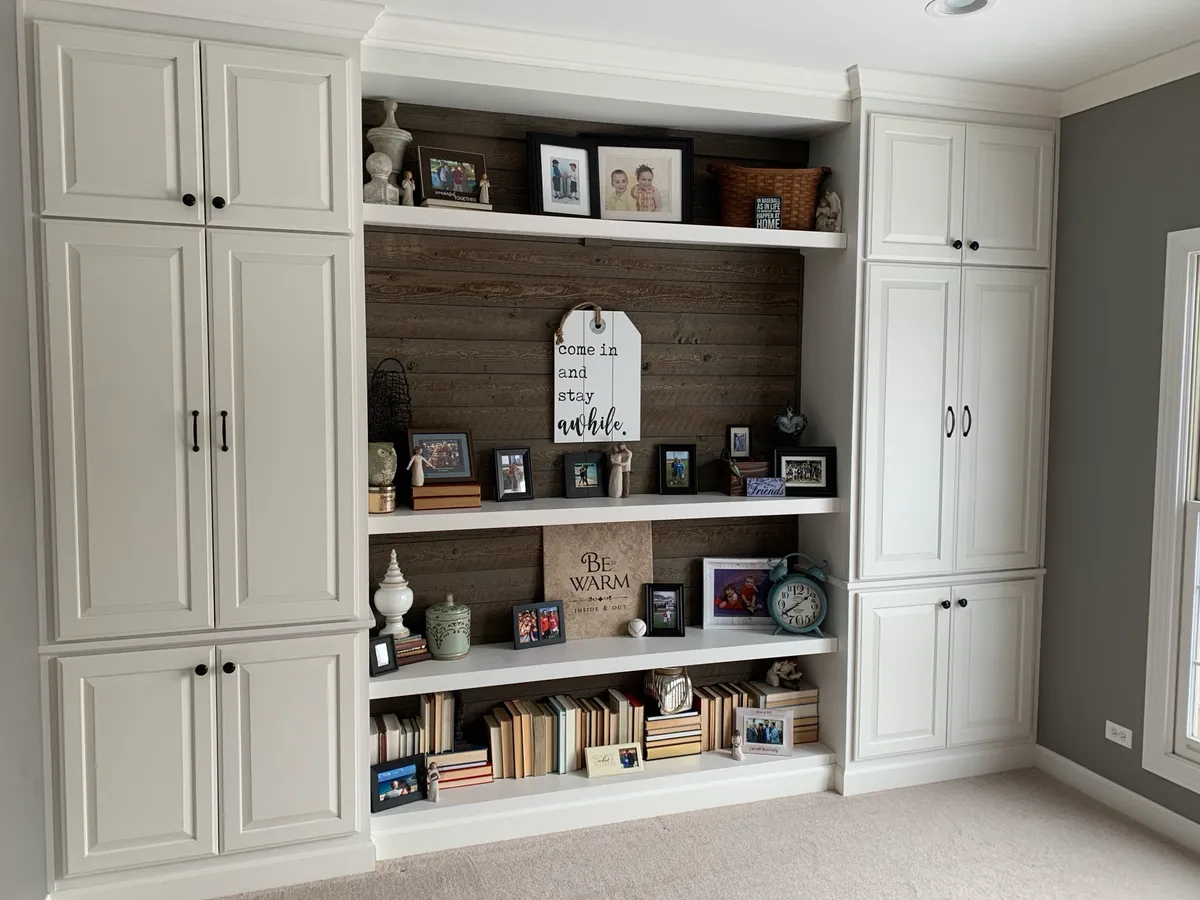 Floor-to-ceiling custom built-in cabinetry with raised-panel doors and shiplap-backed open shelving, Naperville IL